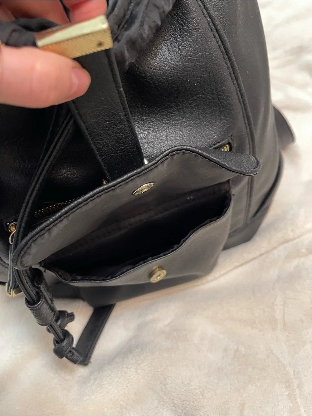 Sleek Black Faux Leather Mini Backpack with Gold Accents